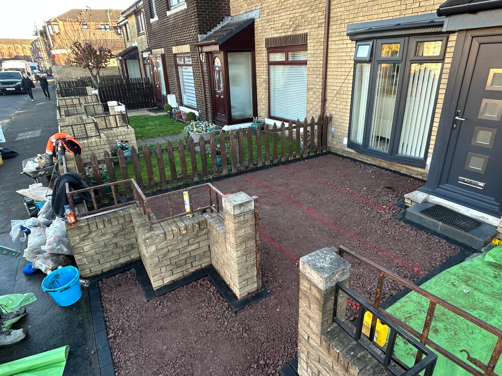 a9b6f9af-36ed-4ae4-a030-daca350d8581 Prepping a garden for resin bound surfacing in Glasgow