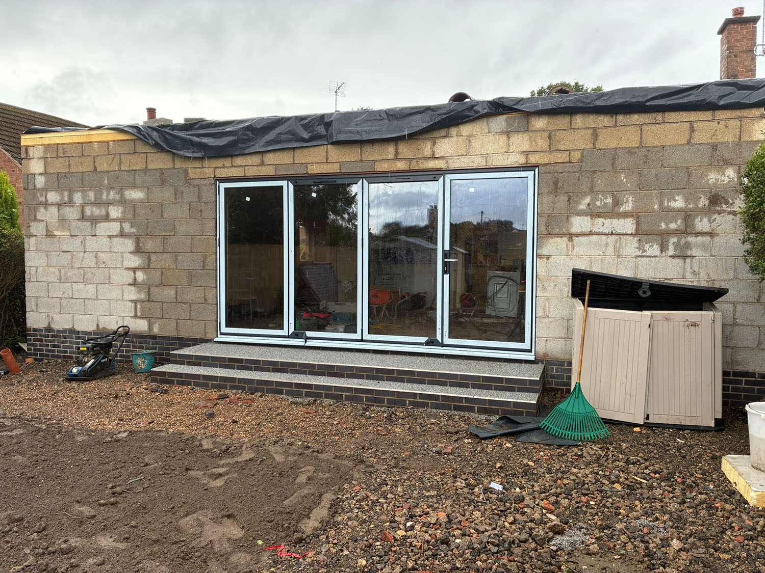 d5ccd9b1-5614-4fe8-ae5c-d0ba367918c7 House being constructed with resin bound steps in Glasgow